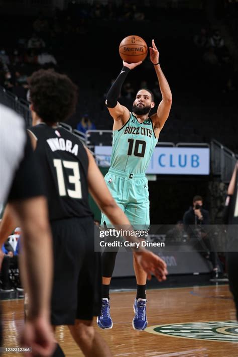 Caleb Martin Of The Charlotte Hornets Shoots The Ball Against The