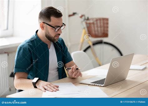 Focused Male Employee Make Notes Watching Webinar Stock Image Image