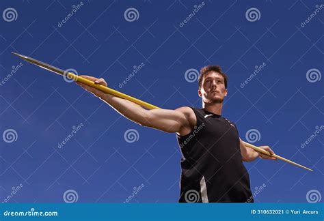 Man Athlete And Javelin Or Blue Sky At Sport Competition On Grass Or