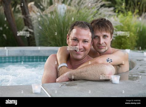 Gay Couple Relaxing In Hot Tub Stock Photo Alamy