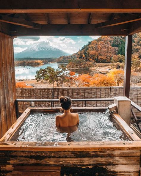 Serene Onsen Experience With A View Of A Volcano