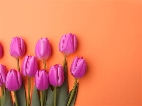 Premium Ai Image A Bunch Of Purple Tulips Are On A Bright Orange