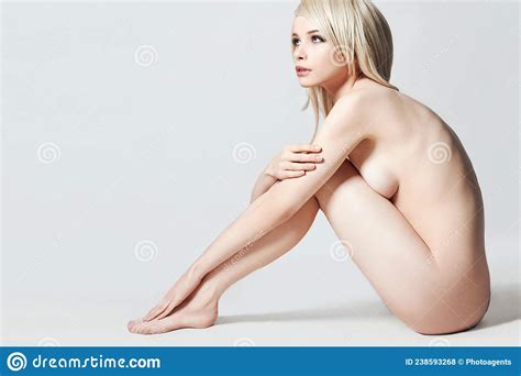 Beautiful Naked Girl With Blond Hair Nude Woman Sitting On The Floor Stock Photo Image Of