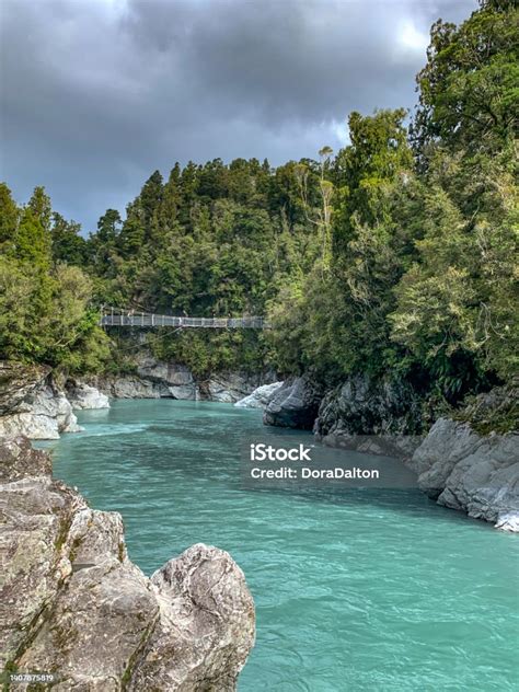 Swing Bridge Crossing To Beautiful Hokitika Gorge Scenic Reserve ...