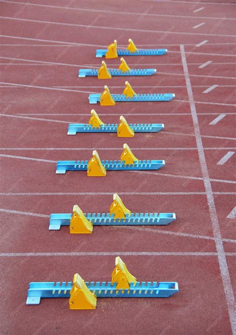 Premium Photo Starting Blocks Athletics Race At Red Athletics Field