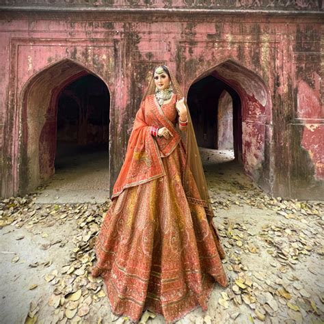 Zardozi Burnt Orange Pankh Embroidered Lehenga Set Amaltas Couture