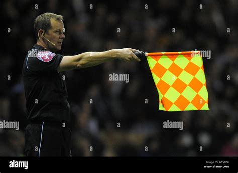 The Referees Assistant Raises His Flag Hi Res Stock Photography And