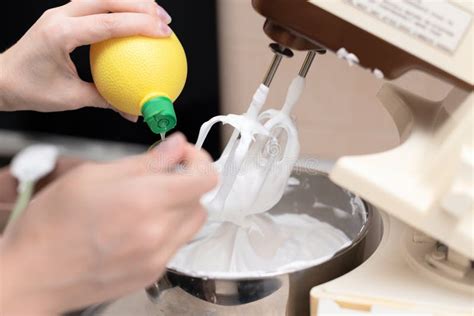 Woman Whipping Egg Whites With Mixer In Bowl Making Homemade Meringue Cake Pavlova Selective