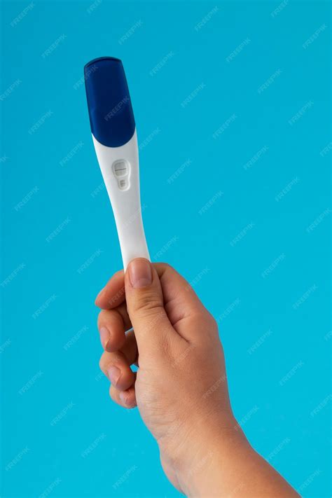 Free Photo Hand Holding Positive Pregnancy Test