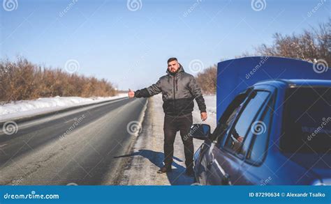 Guy Catches A Car Standing By The Road Stock Photo Image Of Help