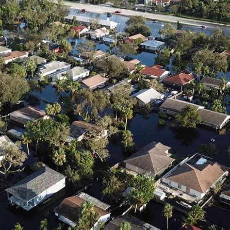 Its River Swollen A Florida Town Wades In Rising Water After Hurricane