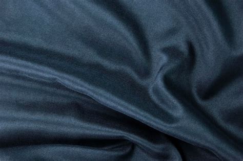 Premium Photo | Dark Silk fabric blue and elegant blue satin with curve ...