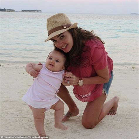 Tamara Ecclestone Shows Off Her Figure In White Bikini As She Walks Beach With Daughter Sophia