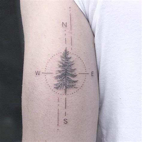 Pine Tree Compass Tattoo On The Back Of The Left Arm Tattoo Artist Lindsay April Tree Tattoo