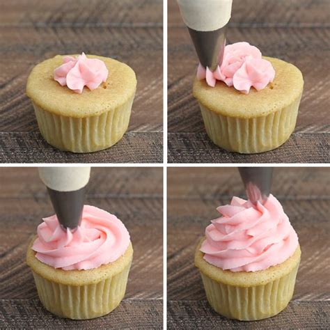 The Cupcakes Are Being Frosted With Pink Icing And Then Topped With A