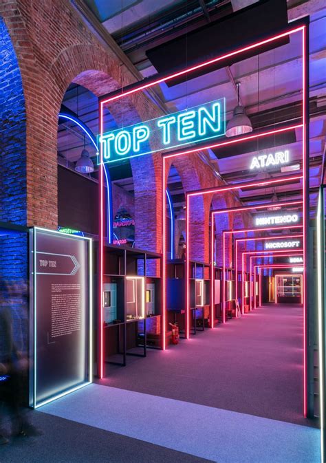 desymbol: Game On's neon-filled exhibition design pays homage to 80s ...