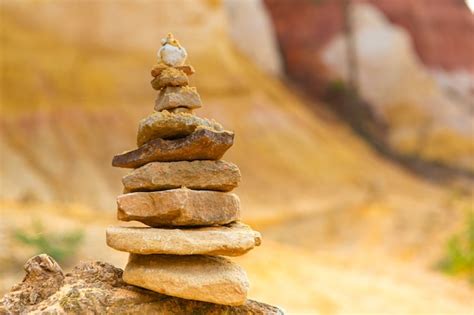 Premium Photo | Pile of stones in balance land art in nature