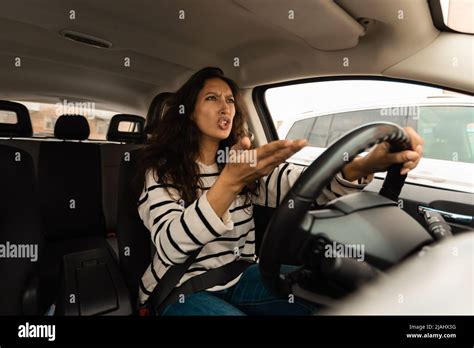 Angry Woman Driving Car Shouting At Somebody Stock Photo Alamy