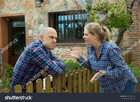 Angry Woman Quarreling Her Male Neighbor Stock Photo 1325790116 ...