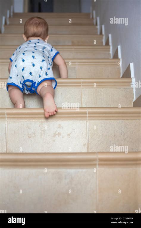 Baby Climbing Stairs High Resolution Stock Photography And Images Alamy