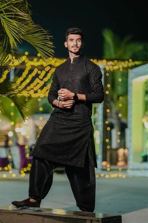 20 Different Black Kurta Pajama Designs For Men That Are Trending In