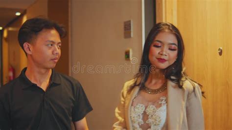 A Hot Asian Woman Is Being Groped And Seduced While Making Out With Her Boyfriend In A Hotel