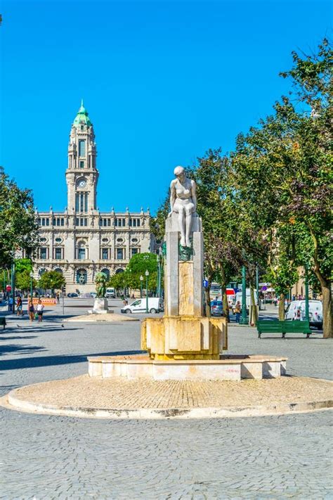 Statue Of The Naked Girl And The Town Hall Of Porto In Portugal