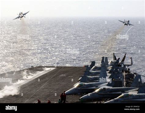 US Navy Two F A 18C Hornets Take Off Simultaneously Stock Photo Alamy