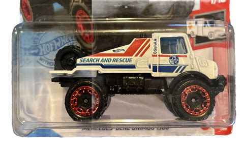 Hot Wheels HW Rescue Mercedes Benz Unimog 1300 White Red Blue 1 10 188 250 Contemporary