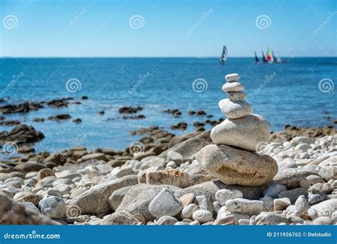 Pile Of Stones On A Beach Ocean Background In Brittany France Stock