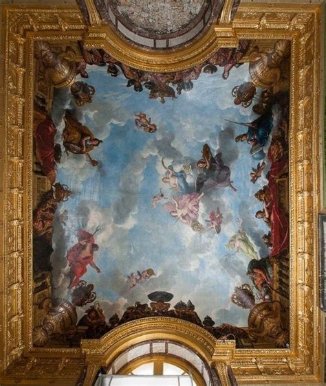 An Ornate Painting On The Ceiling Of A Building