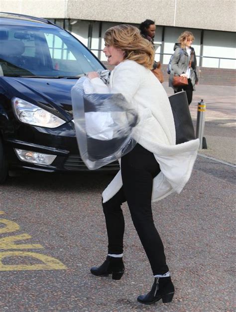 Kate Garraway Gets Caught Up In Strong Winds As She Leaves Good Morning