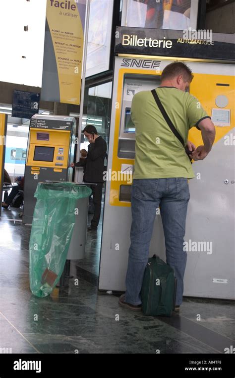 Man Ticket Machine At The Gare Du Nord Railway Station Paris France