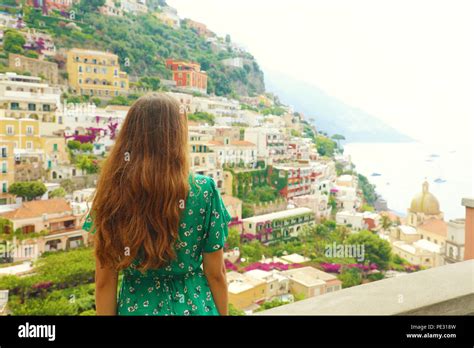 Beautiful Rear View Of A Romantic Sweet Woman In Green Dress Looking At