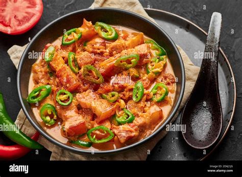 Bicol Express Stew In Black Bowl On Dark Slate Table Top Filipino