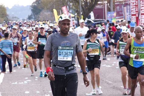 Large Crowd of Runners At Comrades Ultra Marathon – Stock Editorial Photo © lcswart #54541369