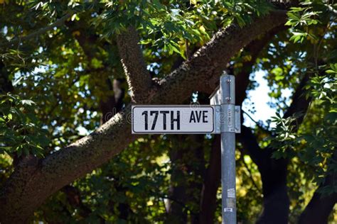 17th Ave Street Name Sign stock photo. Image of black - 188570050