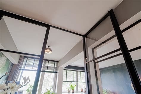 Dubbele Steel Look Taatsdeuren Met Een Glazen Wand