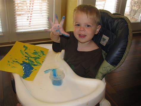 Young Family Chaos: Finger Painting at its Best!