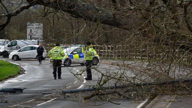 Storm Eunice in pictures: Wrecked cars and toppled buildings show ...