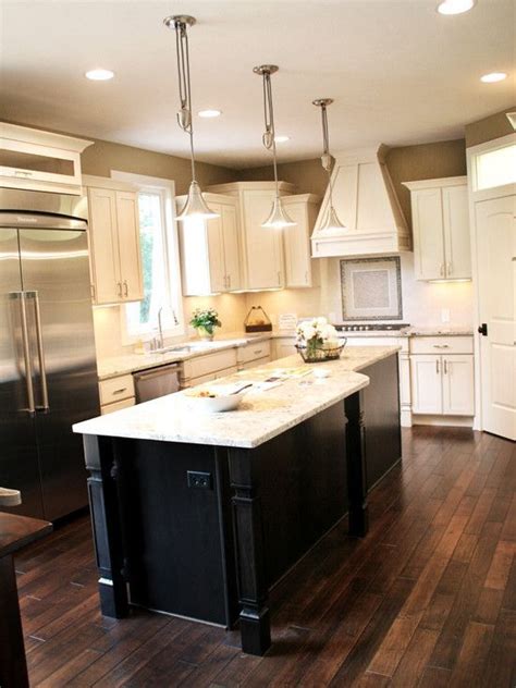 Black kitchen cabinets wood floors | Hawk Haven