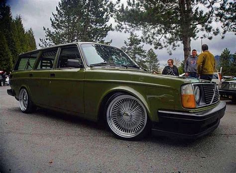 Old Green Volvo Station Wagon In A Parking Lot