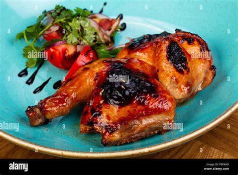 Roasted Half Chicken With Cilantro Stock Photo Alamy