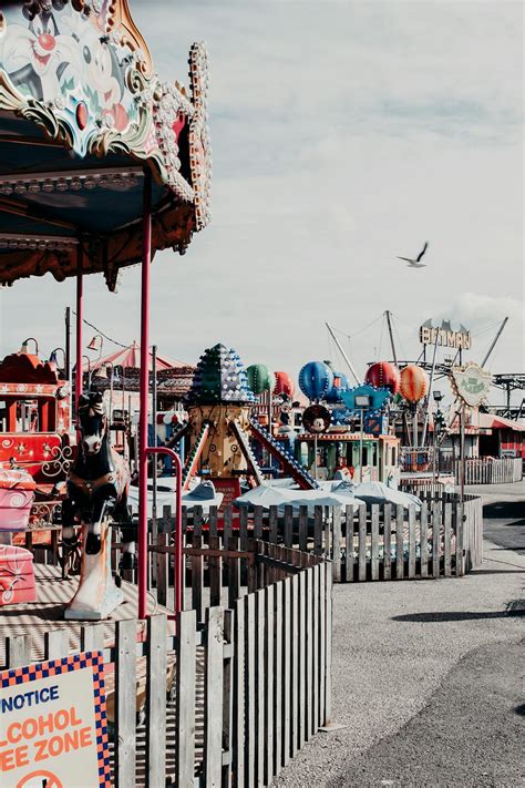 People Riding On Carousel · Free Stock Photo