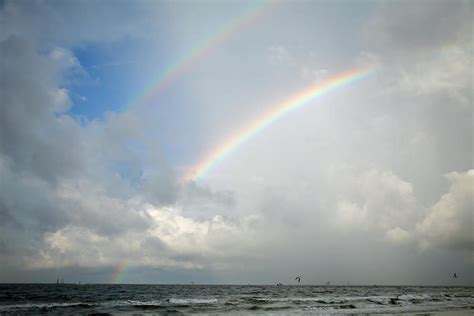 Double Rainbows Photograph by James Jones - Pixels