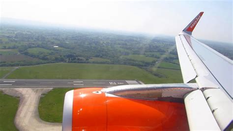 ONBOARD Easyjet A320SL Wing View Landing At Manchester Airport Runway