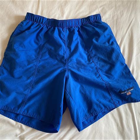 Ralph Lauren Polo Sport Shorts in blue. Condition... - Depop