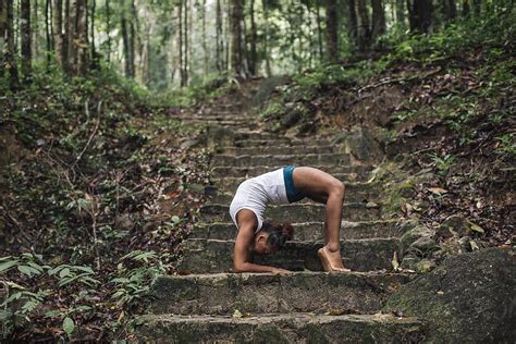 Woman Doing Yoga In Nature Del Colaborador De Stocksy Mosuno Stocksy