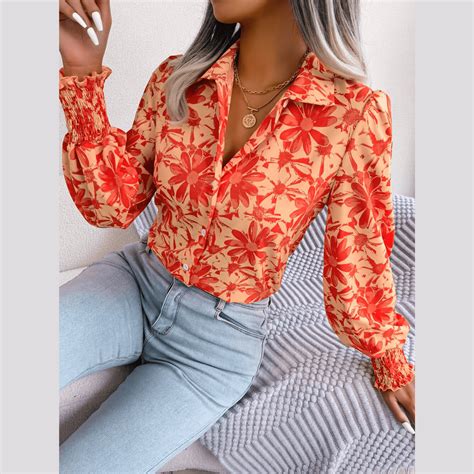 Aminah Orange Floral Bishop Sleeve Blouse Model Mannequin