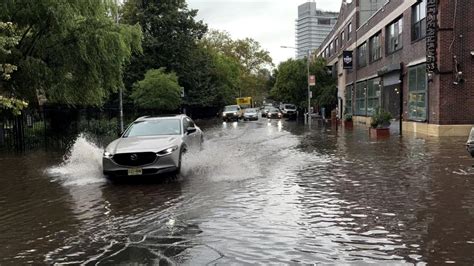 NYC flooding – live: Damage assessed after state of emergency declared